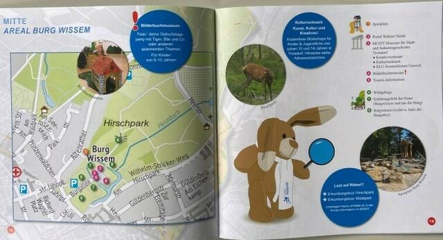 Jeder Stadtteil und auch der Komplex Burg Wissem ist mit einer Doppelseite inklusive Stadtplan vertreten. | Foto: Stadt