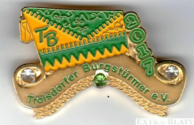 KG Troisdorfer Burgstürmer - Der Ansteck-Pin der KG zeigt die Burgstürmerkappe auf dem mit Brillanten besetzten goldenen Unterzug mit seitlich entlang laufender Jahreszahl. | Foto: Repro Verlag