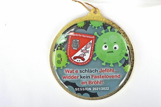 Die Pingsdorfer Narrenzunft hat auf die aktuelle Situation reagiert und auch die Rückseite des Ordens noch einmal ganz speziell gestaltet. | Foto: dru
